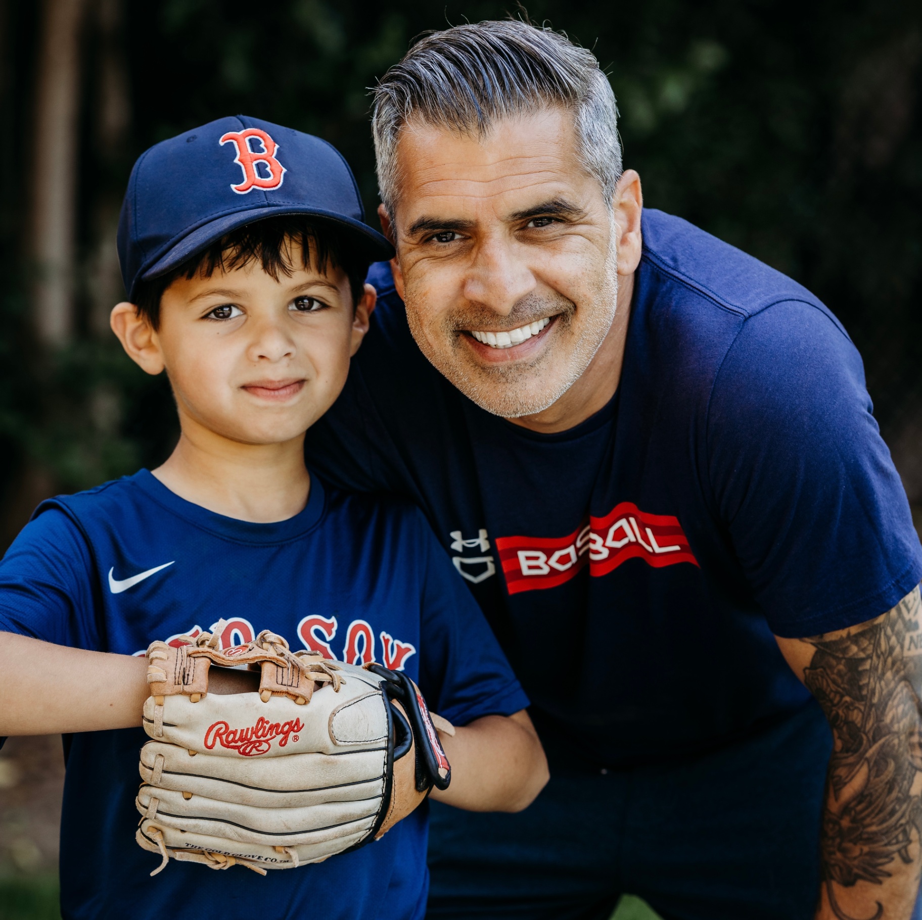 Sharad and his son in Red Sox jerseys