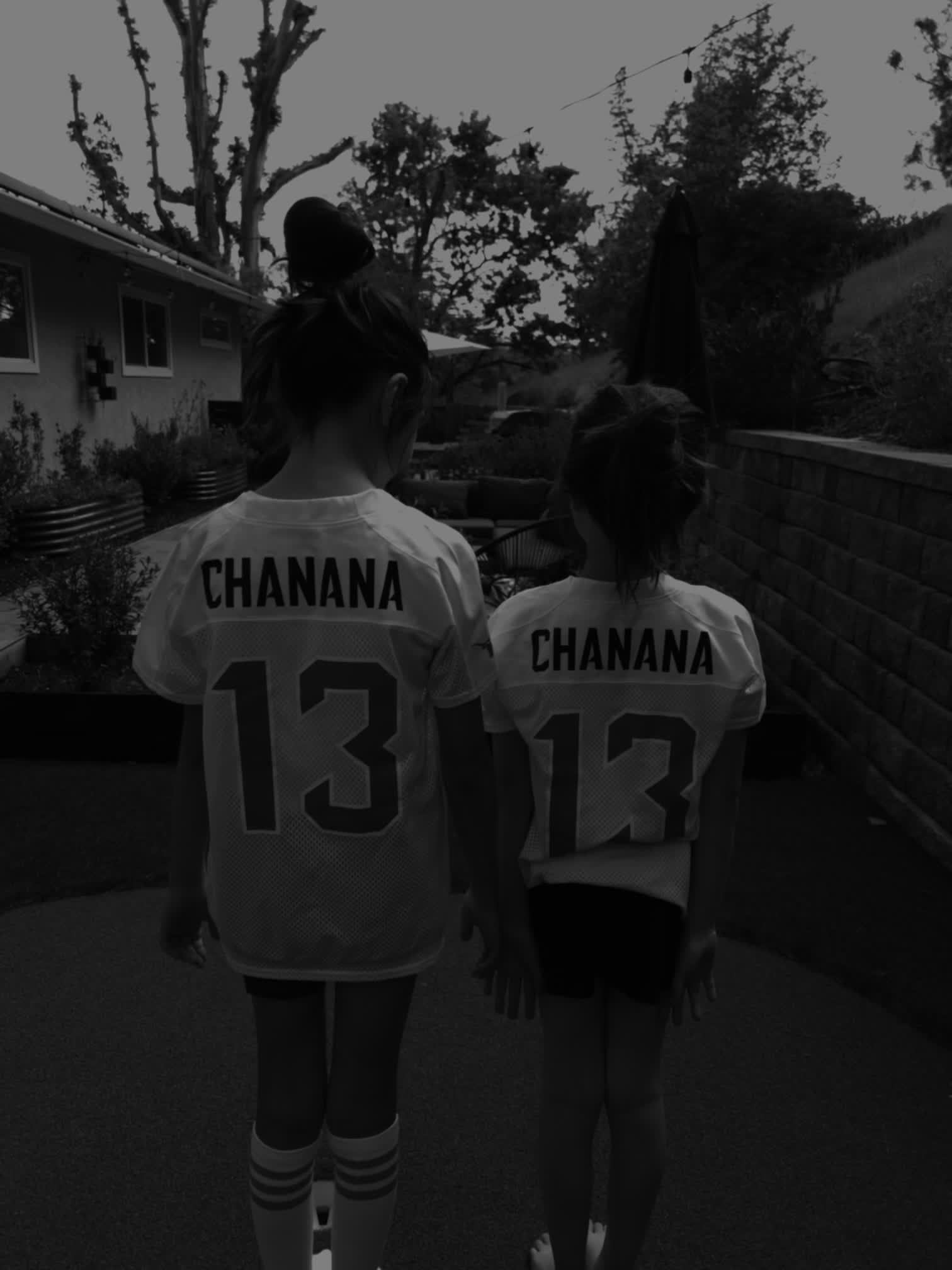 Chanana kids wearing #13 football jerseys